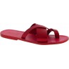 Red leather thongs braid around the big toe and leather sole