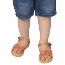 Sandalias gladiadoras trenzadas para niño en piel de becerro naranja con cierre de hebilla