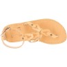 Women's thong sandals with handmade crossed laces in nude calfskin