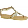 Women's thong sandals with handmade crossed laces in gold laminated calfskin