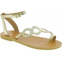 Women's thong sandals with circles handmade in gold laminated calfskin