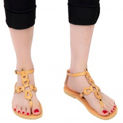 Sandalias de mujer hechas a mano con cordones cruzados en piel de becerro color nude