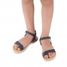 Girl's thong sandals in fuchsia calfskin with buckle closure
